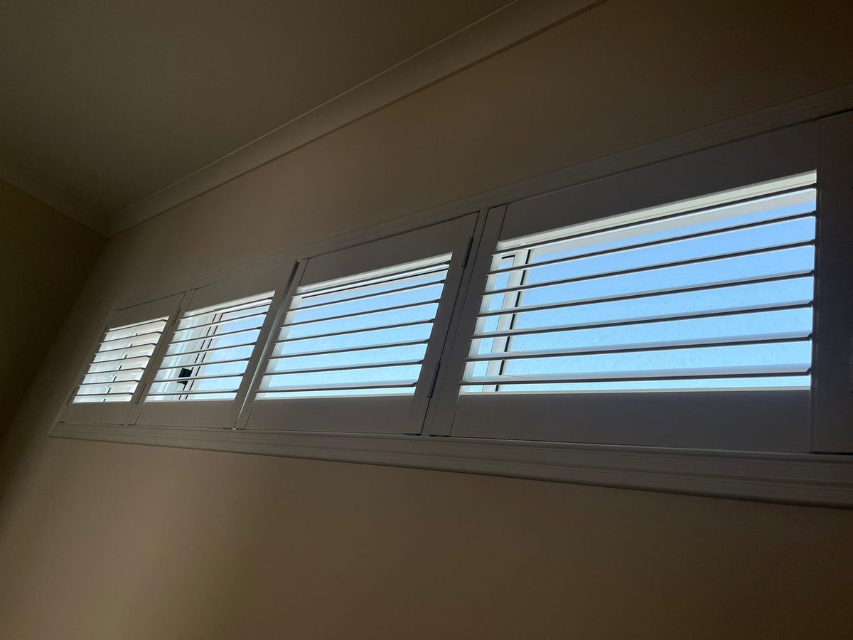 Plantation shutters on a Perth window